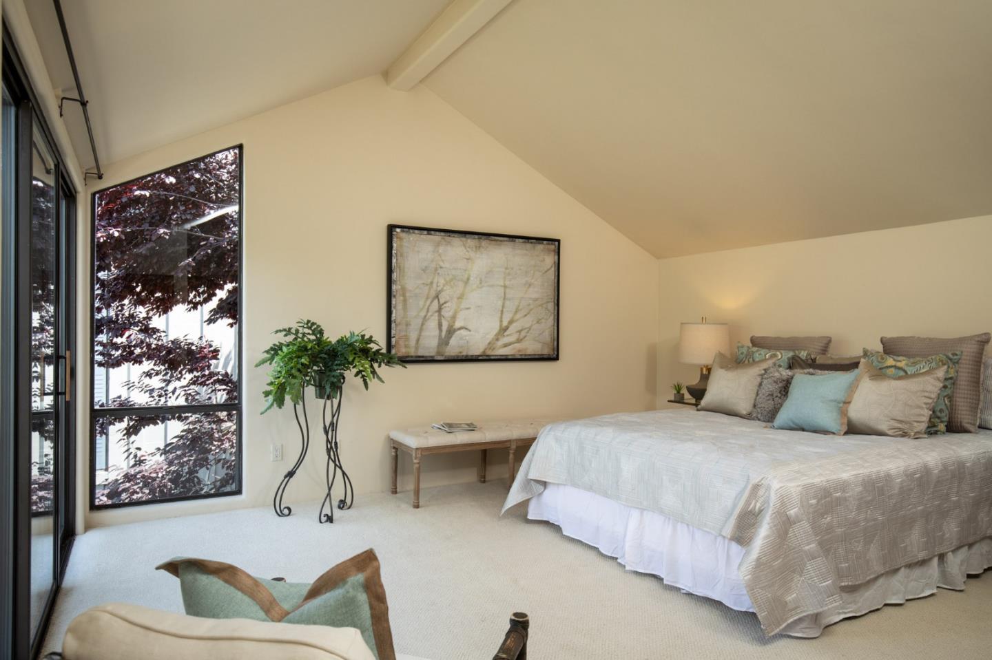 9546 Maple Court Carmel, CA 93923 - Photo 5 of 20 a bedroom with a bed and a couch