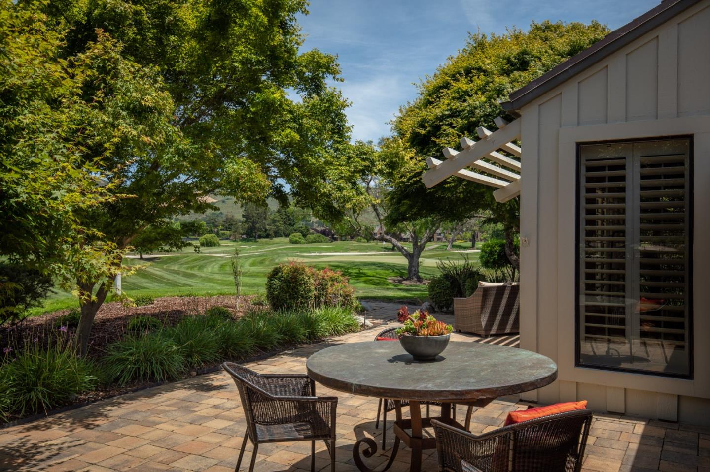9546 Maple Court Carmel, CA 93923 - Photo 6 of 20 a backyard of a house with outdoor seating