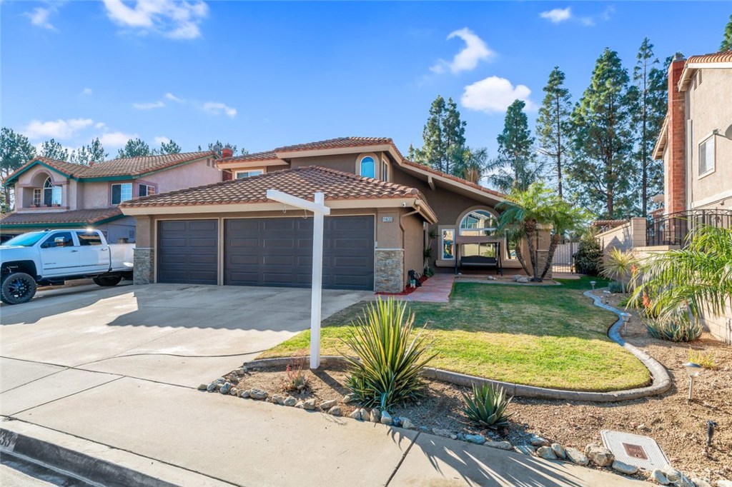 11633 Treviso Way Rancho Cucamonga, CA 91701 - Photo 1 of 1 a view of a house with a swimming pool