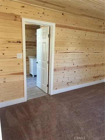 a bathroom with a tub and shower