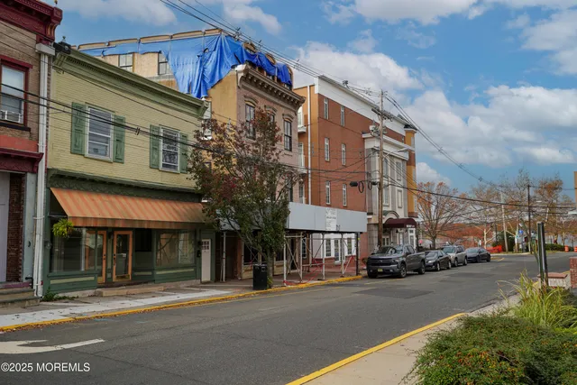 a view of a building with a street