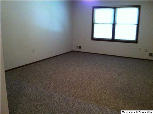18 Spicy Pond Road Howell, NJ 07731 - Photo 9 of 11 an empty room with a window
