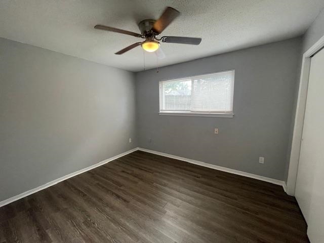 605 Patterson Street, Unit 9 Memphis, TN 38111 - Photo 6 of 10 an empty room with wooden floor and windows