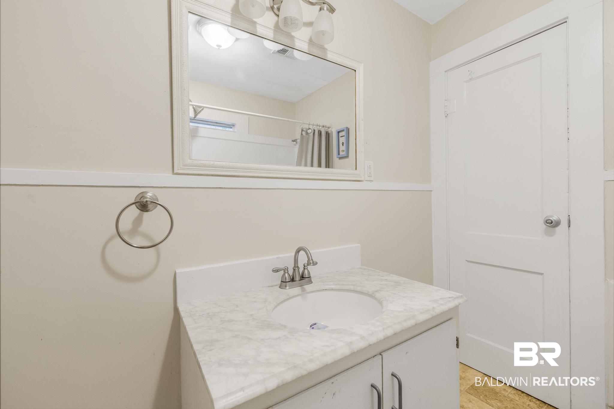 405 North Pine Street Foley, AL 36535 - Photo 27 of 33 Full bathroom with vanity and a shower with curtain