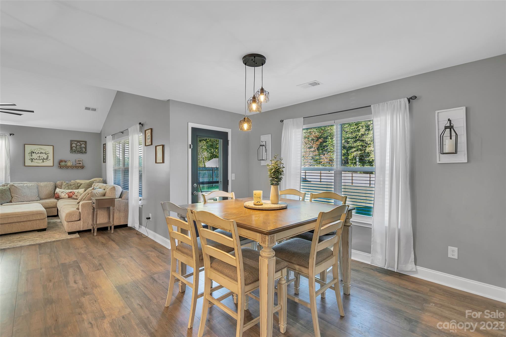 871 West Keepsake Lane Inman, SC 29349 - Photo 12 of 26 a view of a dining room with furniture window and wooden floor