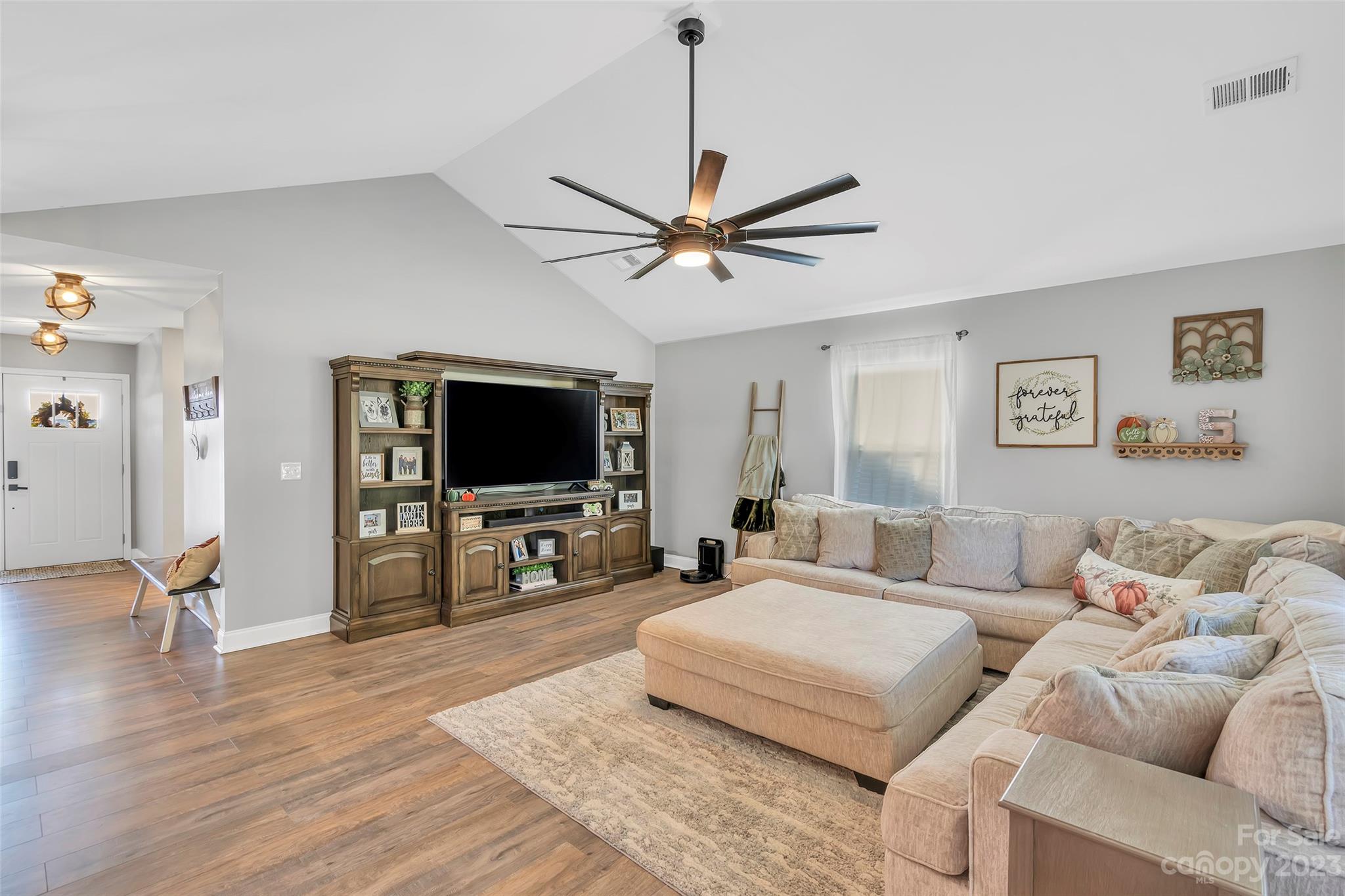 871 West Keepsake Lane Inman, SC 29349 - Photo 6 of 26 a living room with furniture and a flat screen tv