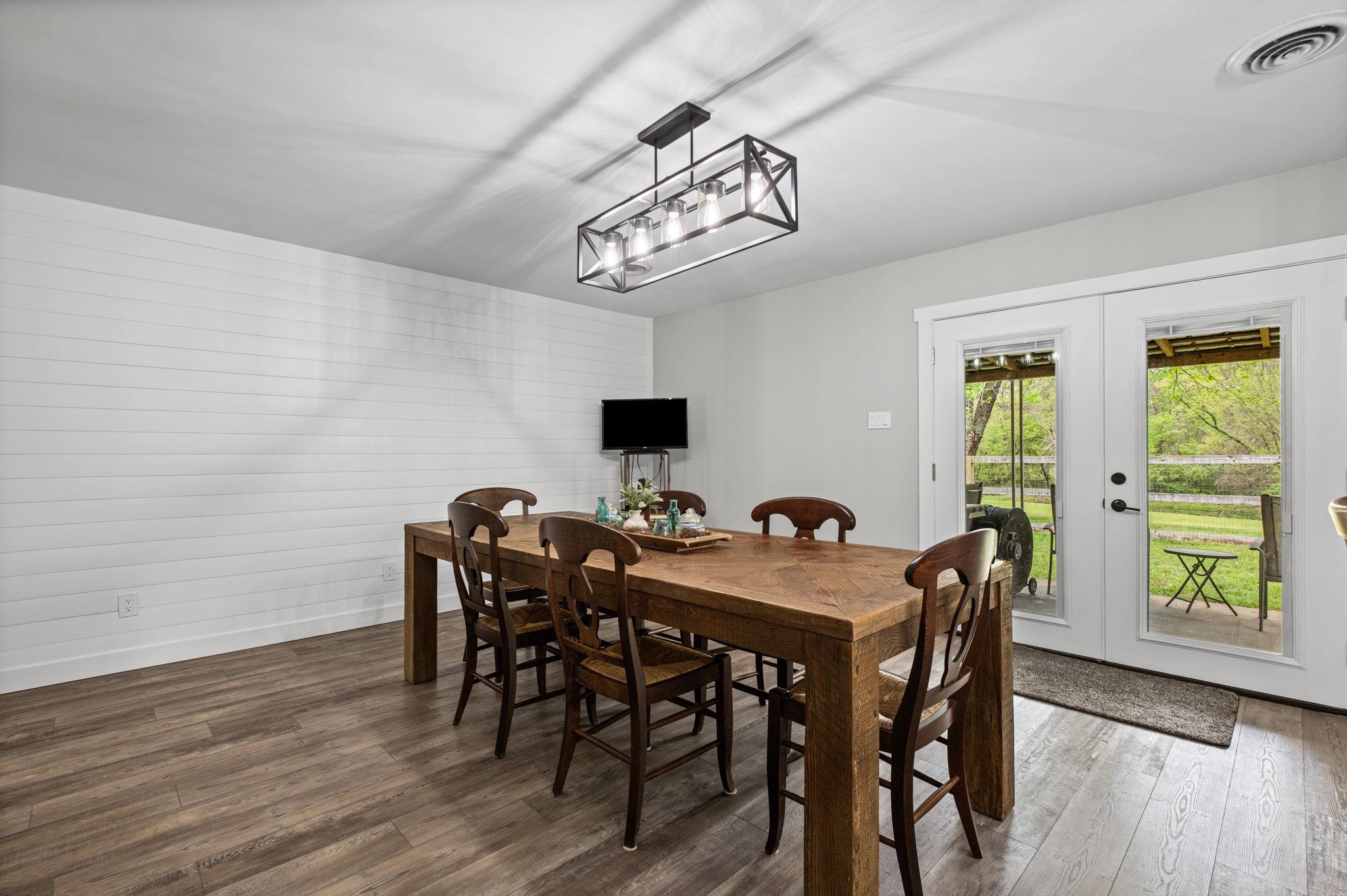 58 Hayes Road Munford, TN 38058 - Photo 14 of 40 Dining room with french doors and wood finished floors
