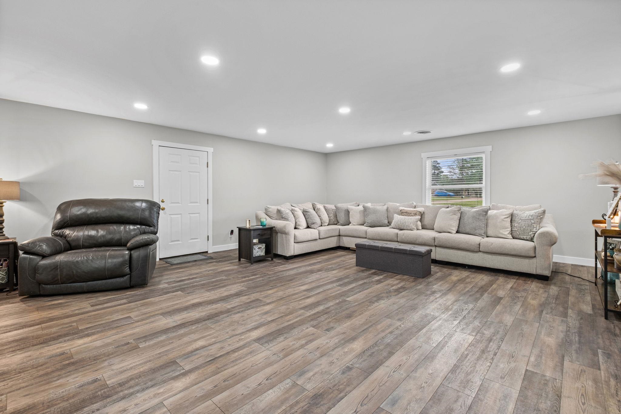 58 Hayes Road Munford, TN 38058 - Photo 18 of 40 Living area with recessed lighting and wood finished floors