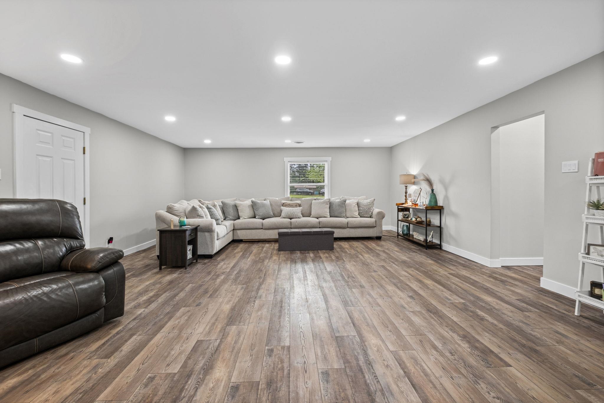58 Hayes Road Munford, TN 38058 - Photo 20 of 40 Living room with recessed lighting and dark wood finished floors