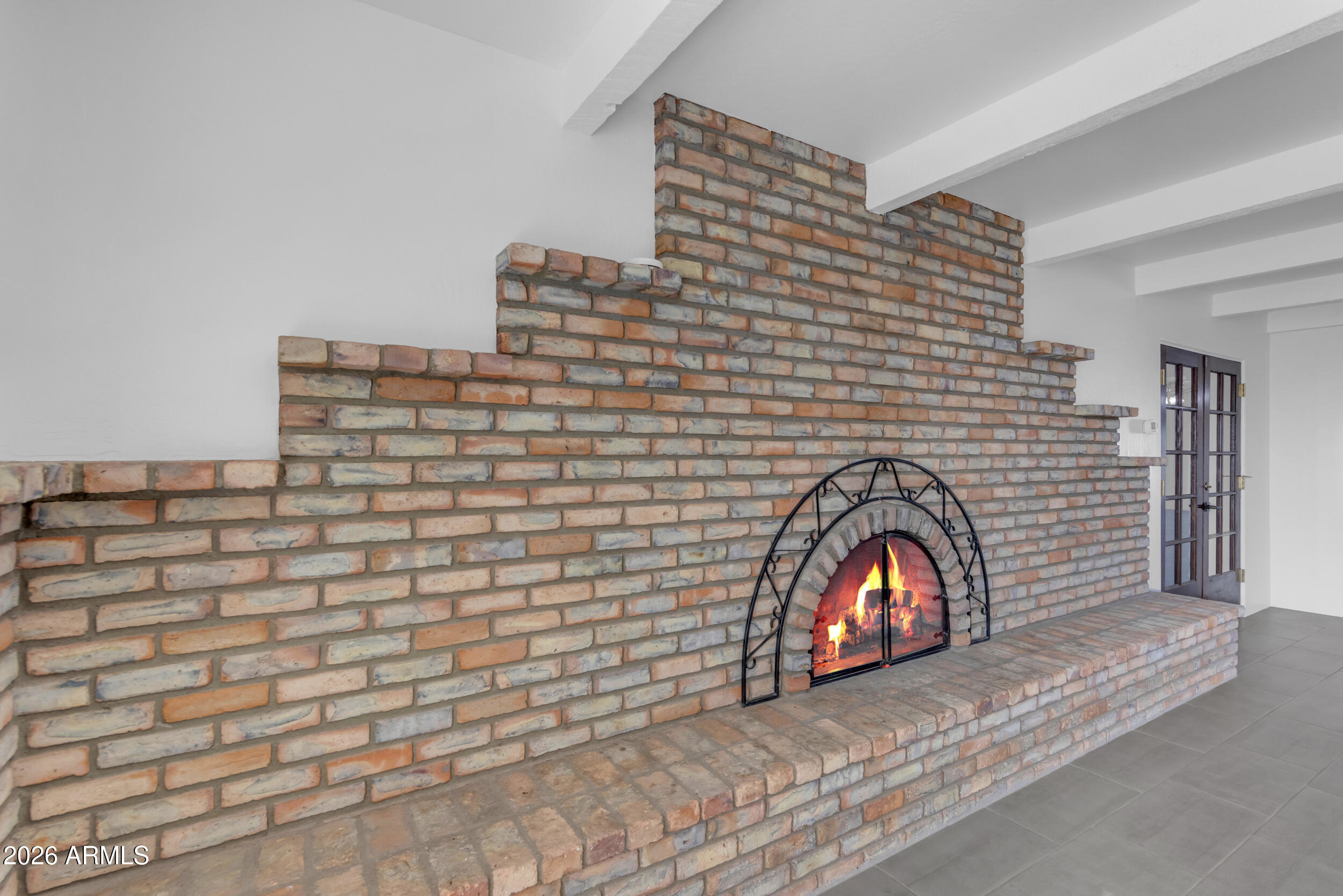 16555 West Lower Buckeye Road Goodyear, AZ 85338 - Photo 18 of 55 Brick Fireplace Feature
