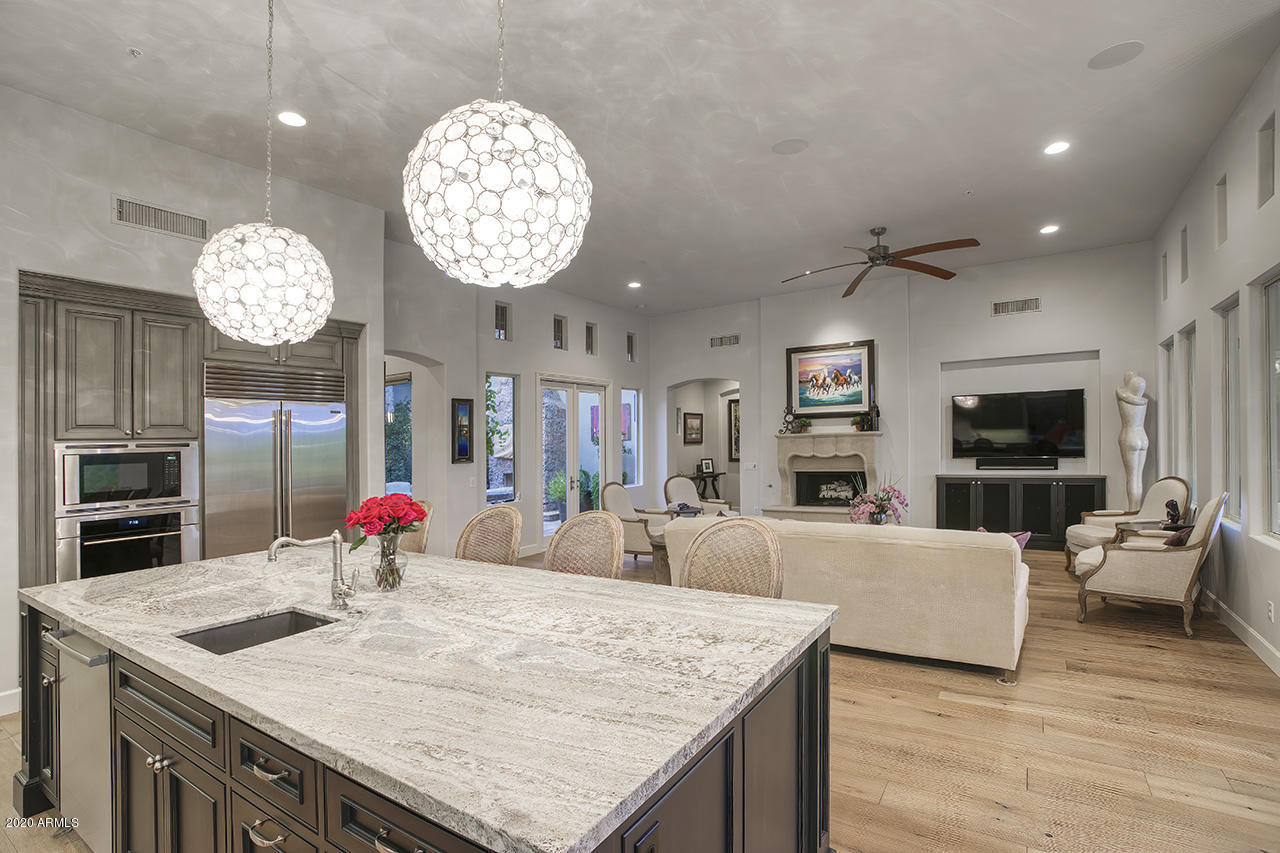 9741 East Mountain Spring Road Scottsdale, AZ 85255 - Photo 16 of 52 Kitchen open to Family Room