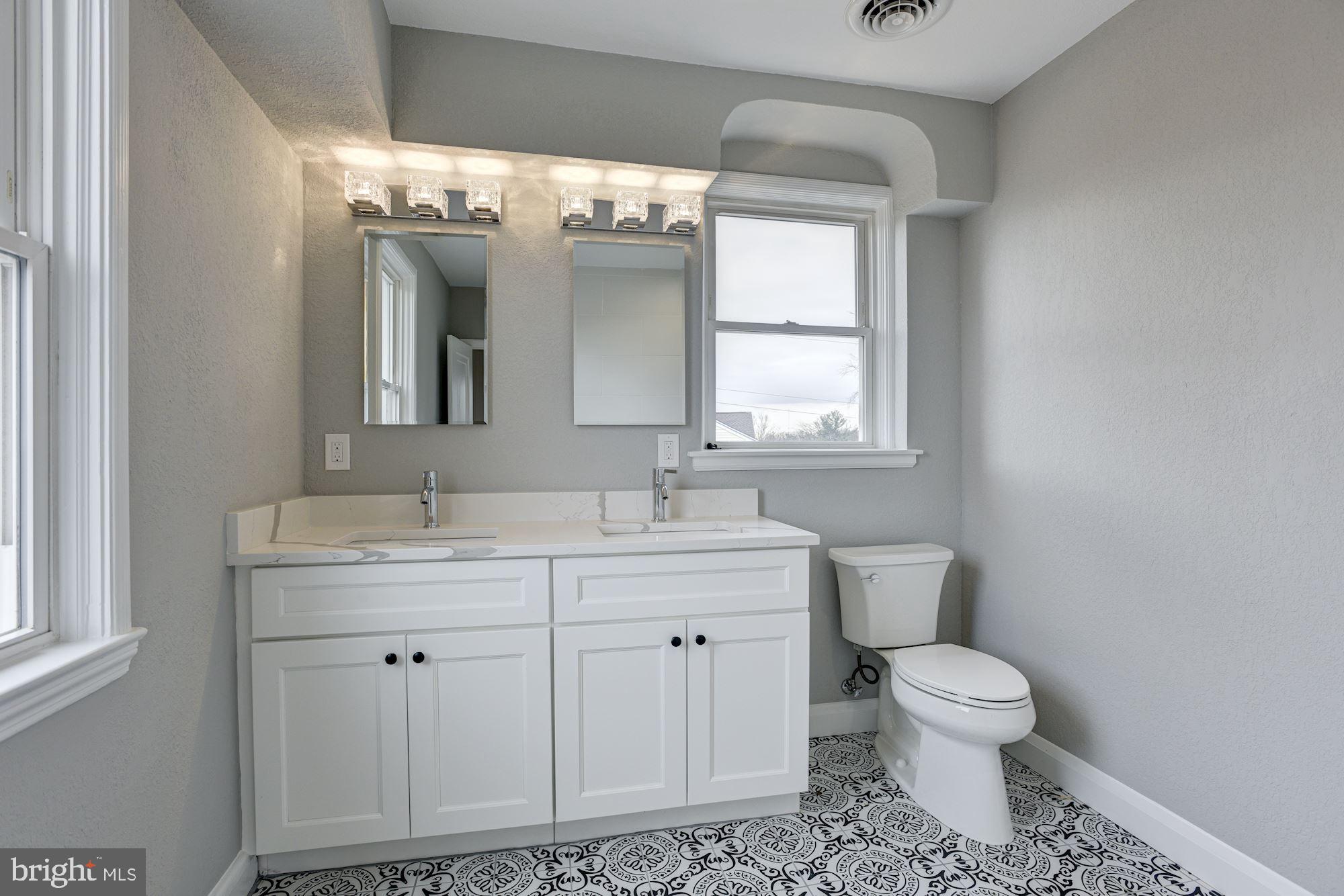 6305 Mt Ridge Road Catonsville, MD 21228 - Photo 14 of 31 Primary Bath features double vanity & glass shower
