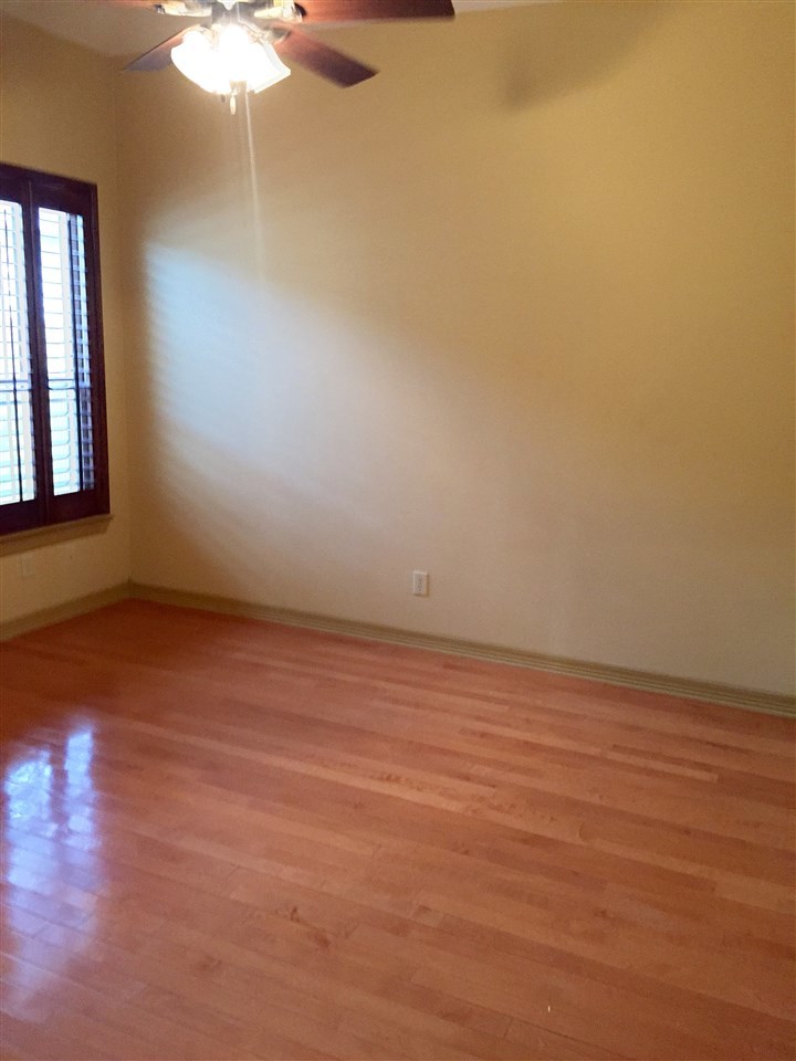 10809 Marfa Road Laredo, TX 78045 - Photo 6 of 9 an empty room with a empty space and a window