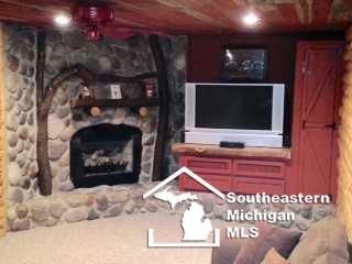 2896 Stewart Road Monroe, MI 48162 - Photo 22 of 25 Basement fireplace