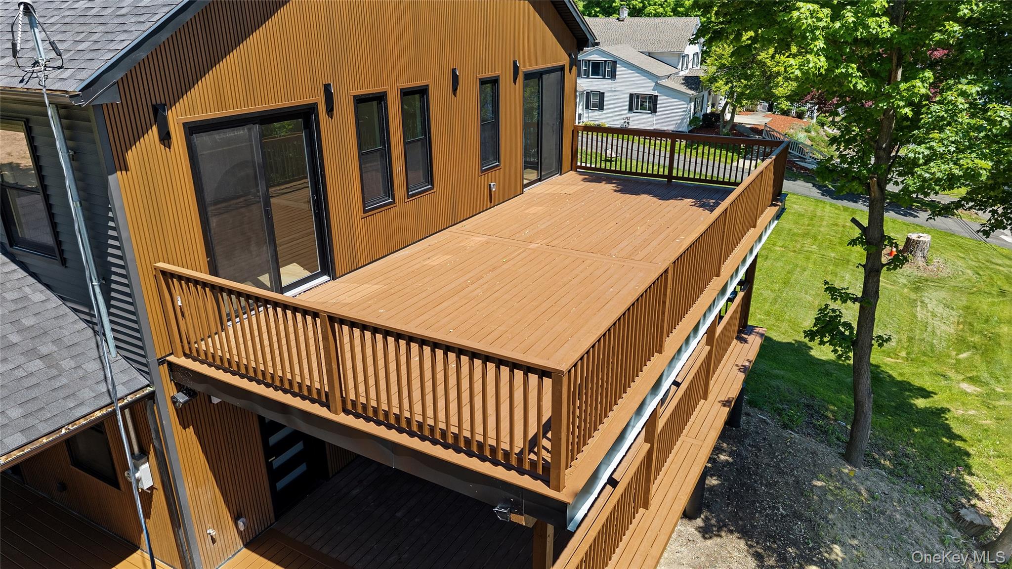 548 Lakes Road Monroe, NY 10950 - Photo 48 of 50 a view of balcony with wooden floor and fence