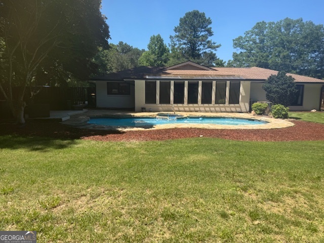 558 Kenwood Road Fayetteville, GA 30214 - Photo 7 of 33 a front view of house with yard and green space