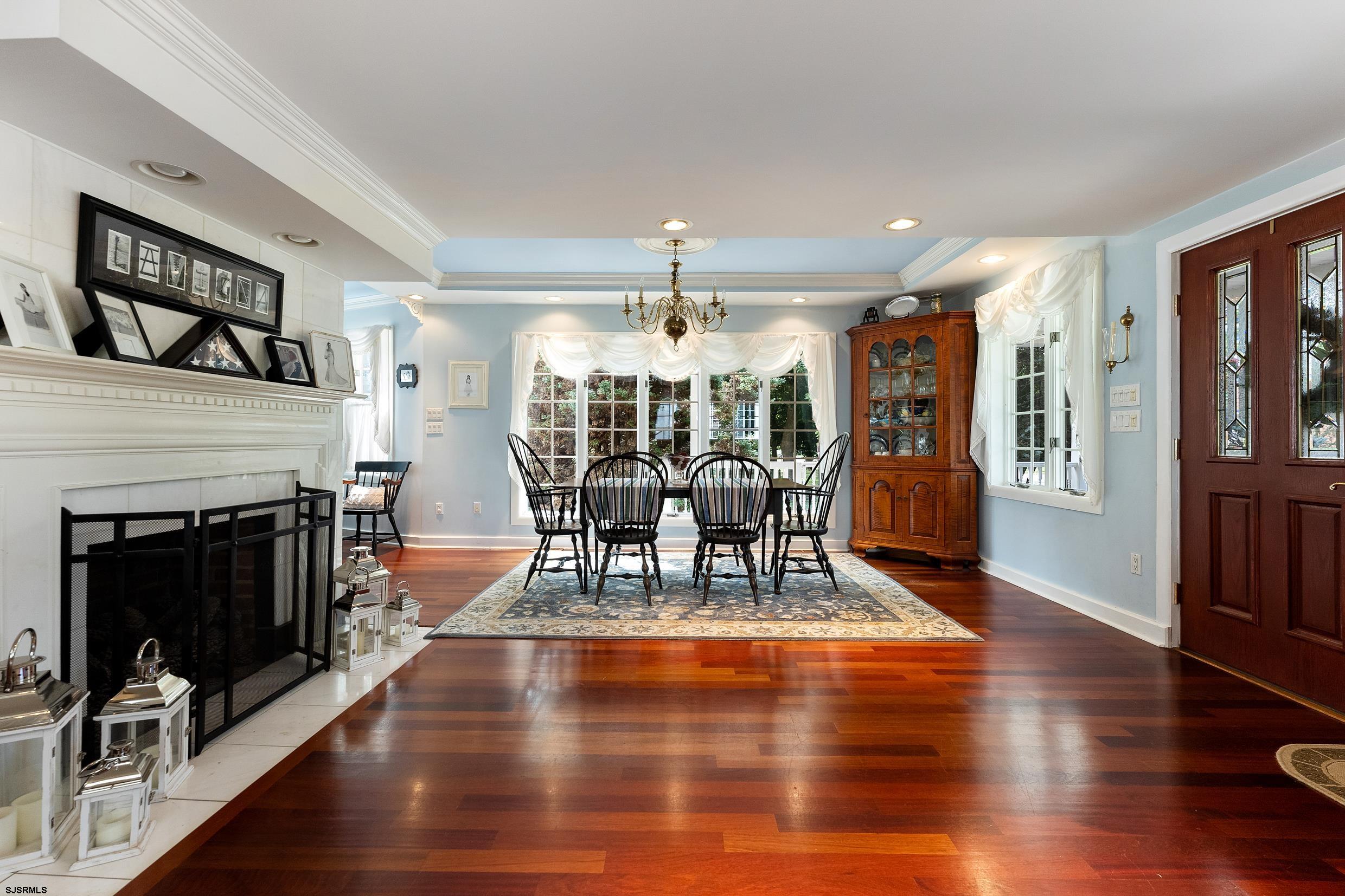 2024 Shore Road Linwood, NJ 08221 - Photo 18 of 51 a living room with fireplace furniture and a wooden floor