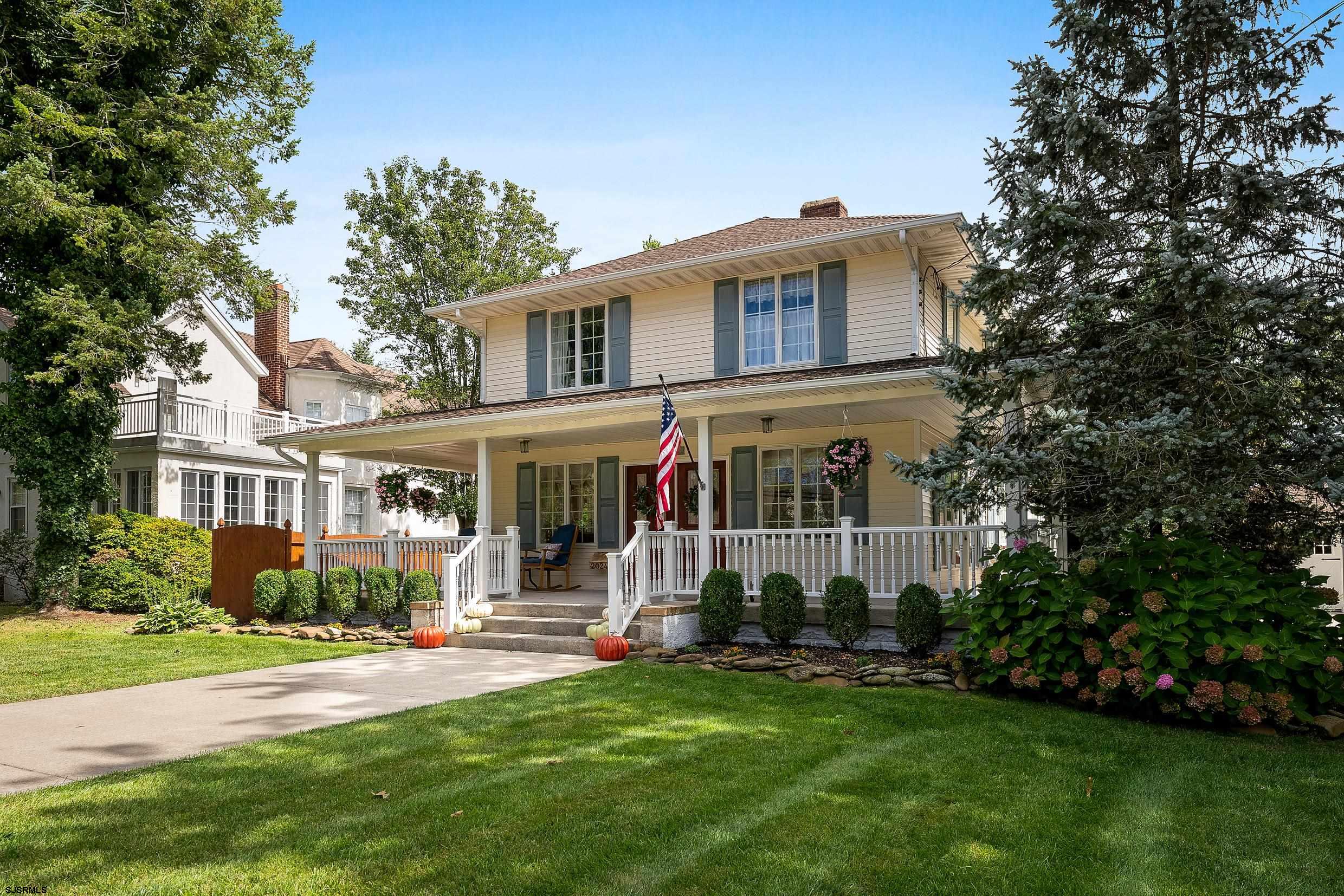2024 Shore Road Linwood, NJ 08221 - Photo 2 of 51 a front view of house with yard and green space
