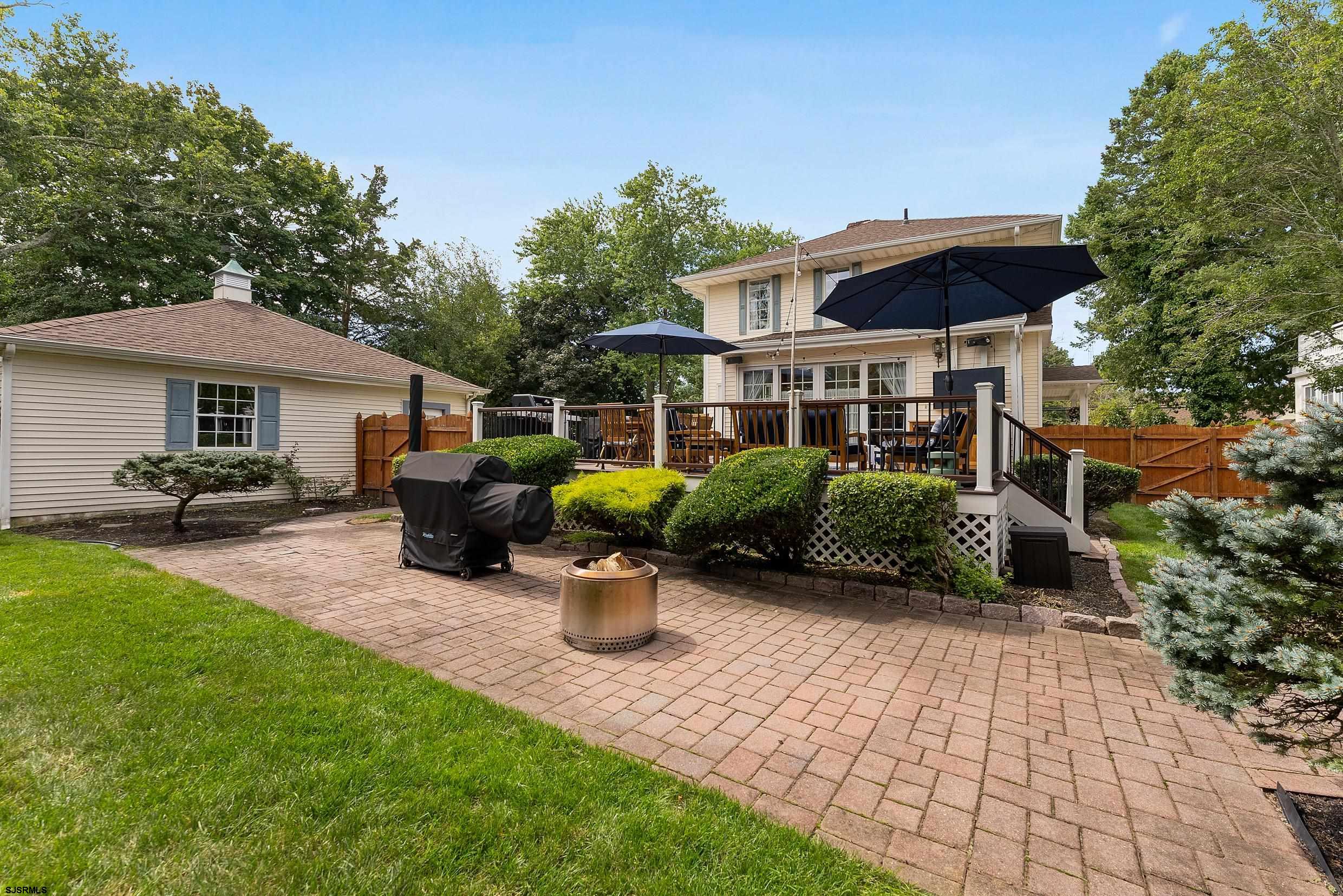 2024 Shore Road Linwood, NJ 08221 - Photo 37 of 51 a view of a house with backyard sitting area and garden