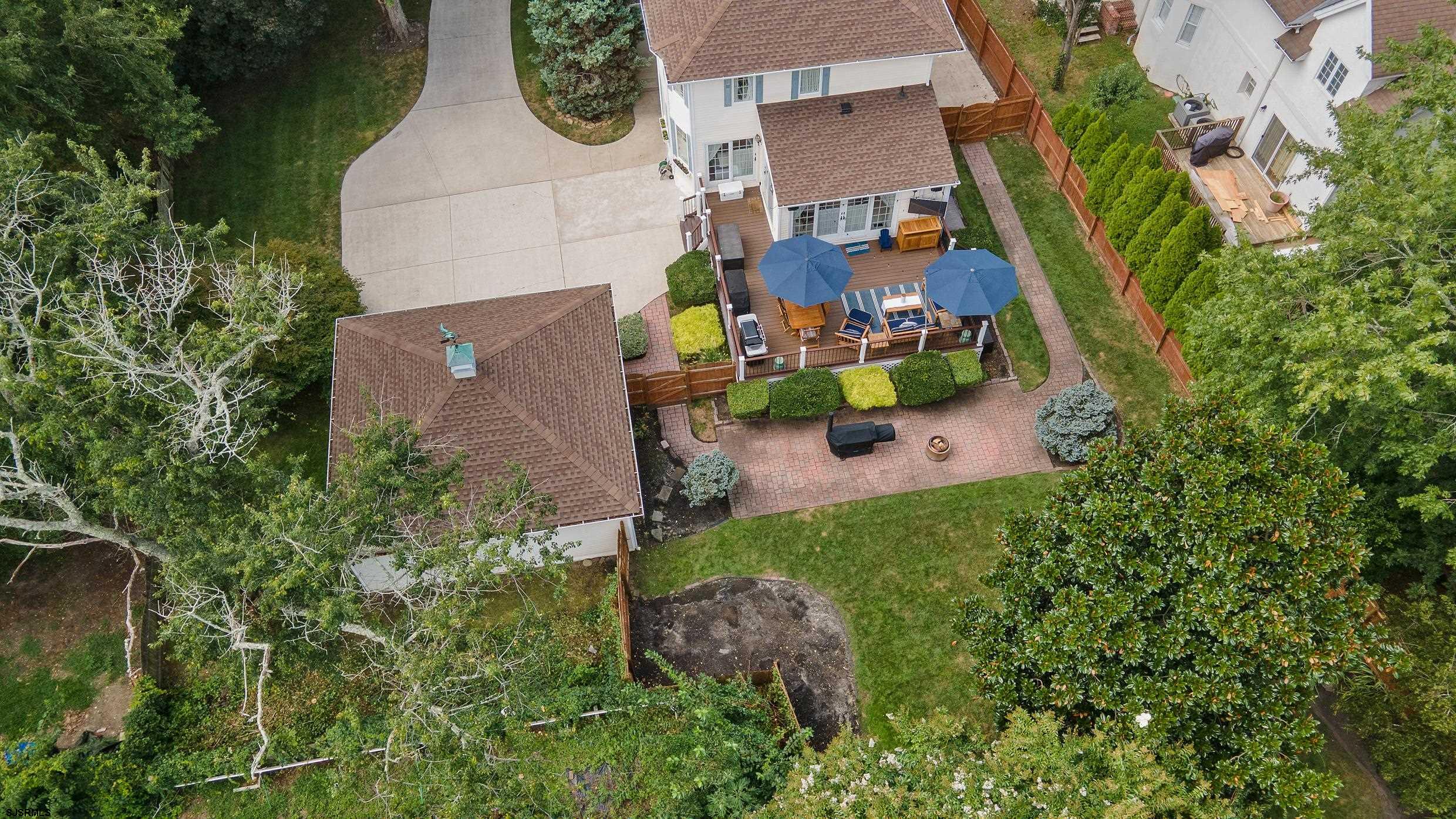 2024 Shore Road Linwood, NJ 08221 - Photo 10 of 51 an aerial view of a house with yard swimming pool and outdoor seating