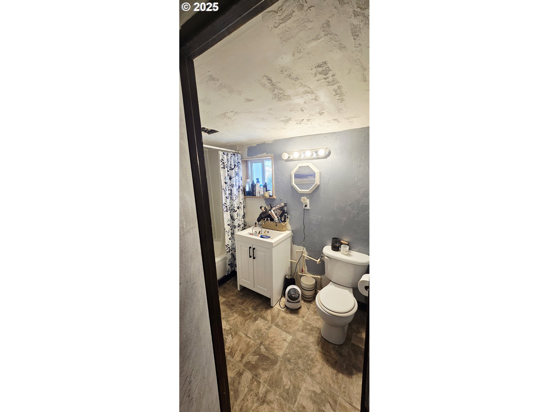 1503 R Avenue La Grande, OR 97850 - Photo 10 of 18 a bathroom with a toilet and a view of bathroom