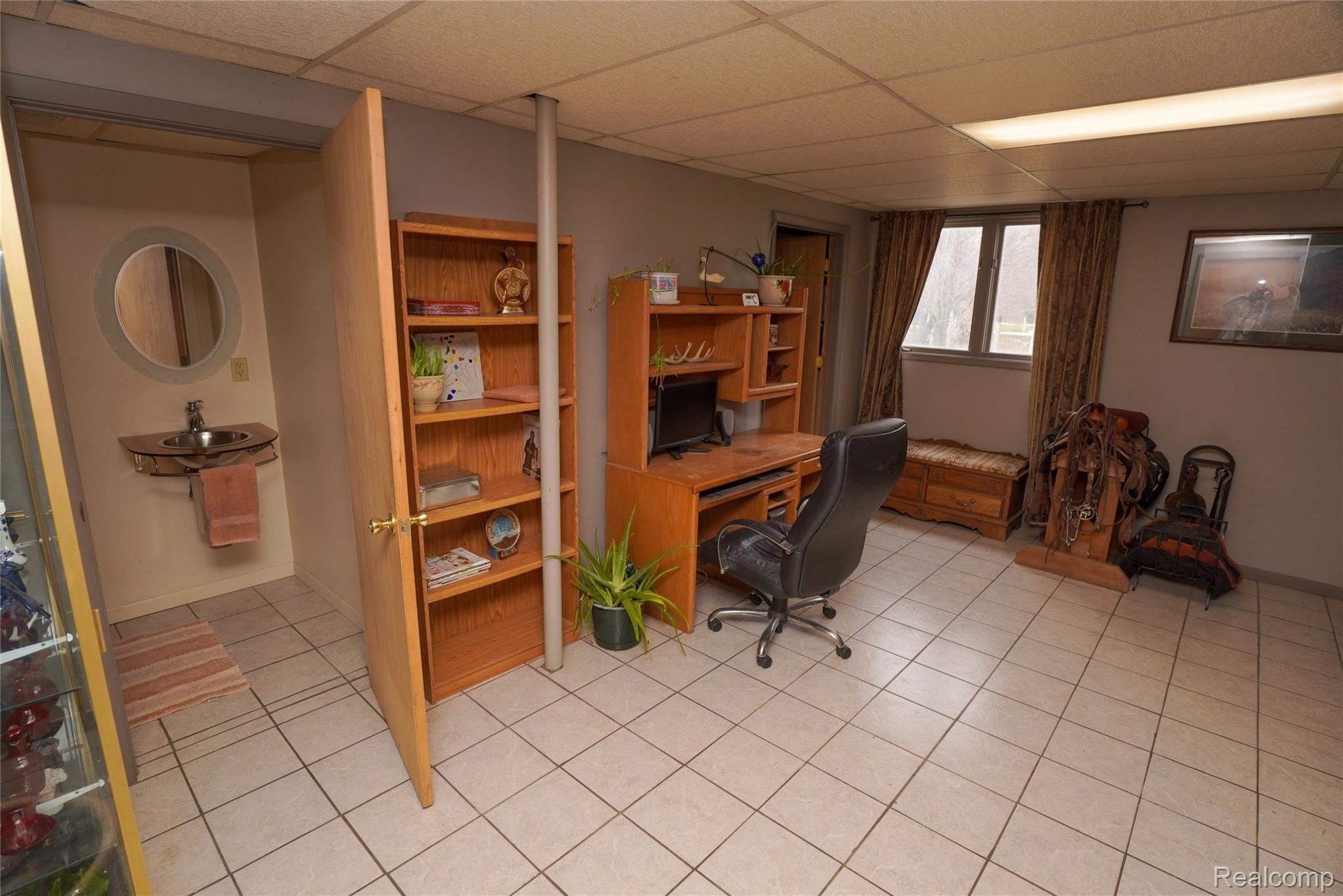 6996 Crofoot Road Fowlerville, MI 48836 - Photo 22 of 36 Finished Lower Level!
