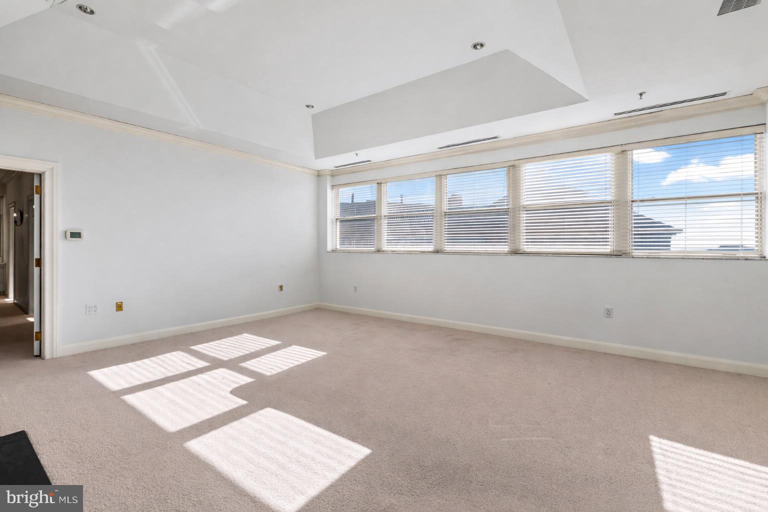 3801 Canterbury Road, Unit 1104 Baltimore, MD 21218 - Photo 29 of 74 a view of an empty room with a window
