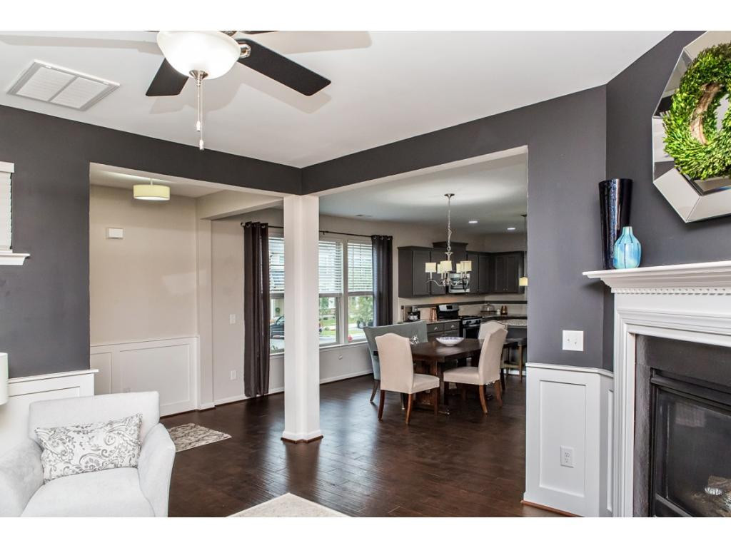 1014 Midtowne Way Durham, NC 27713 - Photo 7 of 24 a living room with furniture and a fireplace