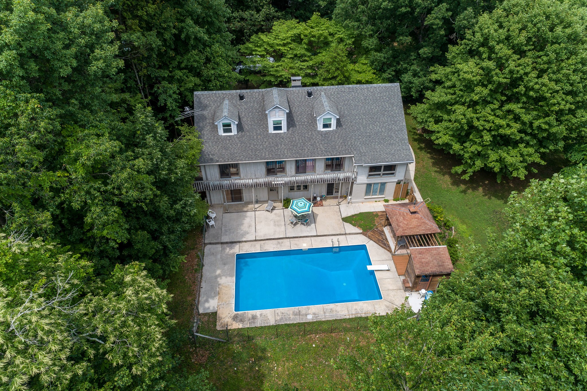 2645 Cole Ridge Road Beechgrove, TN 37018 - Photo 1 of 50 an aerial view of residential house with outdoor space and trees all around