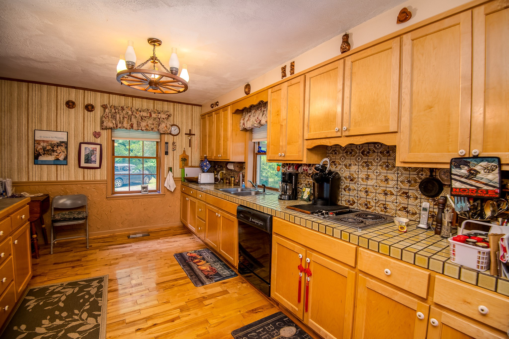 2645 Cole Ridge Road Beechgrove, TN 37018 - Photo 12 of 50 a kitchen with stainless steel appliances granite countertop a stove a sink and a refrigerator
