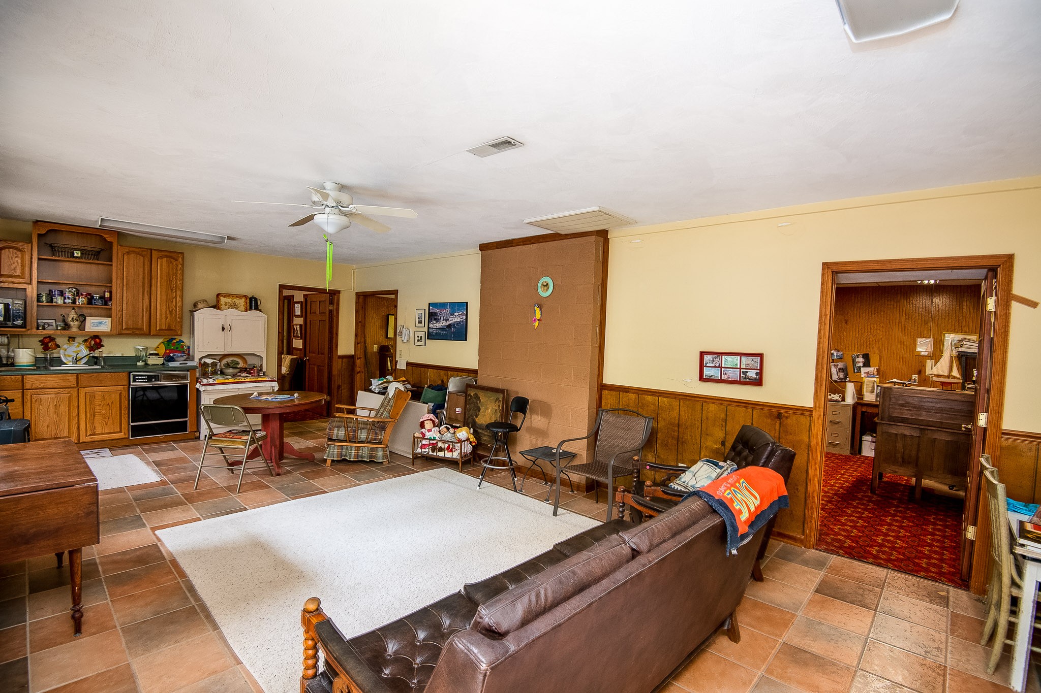 2645 Cole Ridge Road Beechgrove, TN 37018 - Photo 34 of 50 a living room with furniture a rug and kitchen view