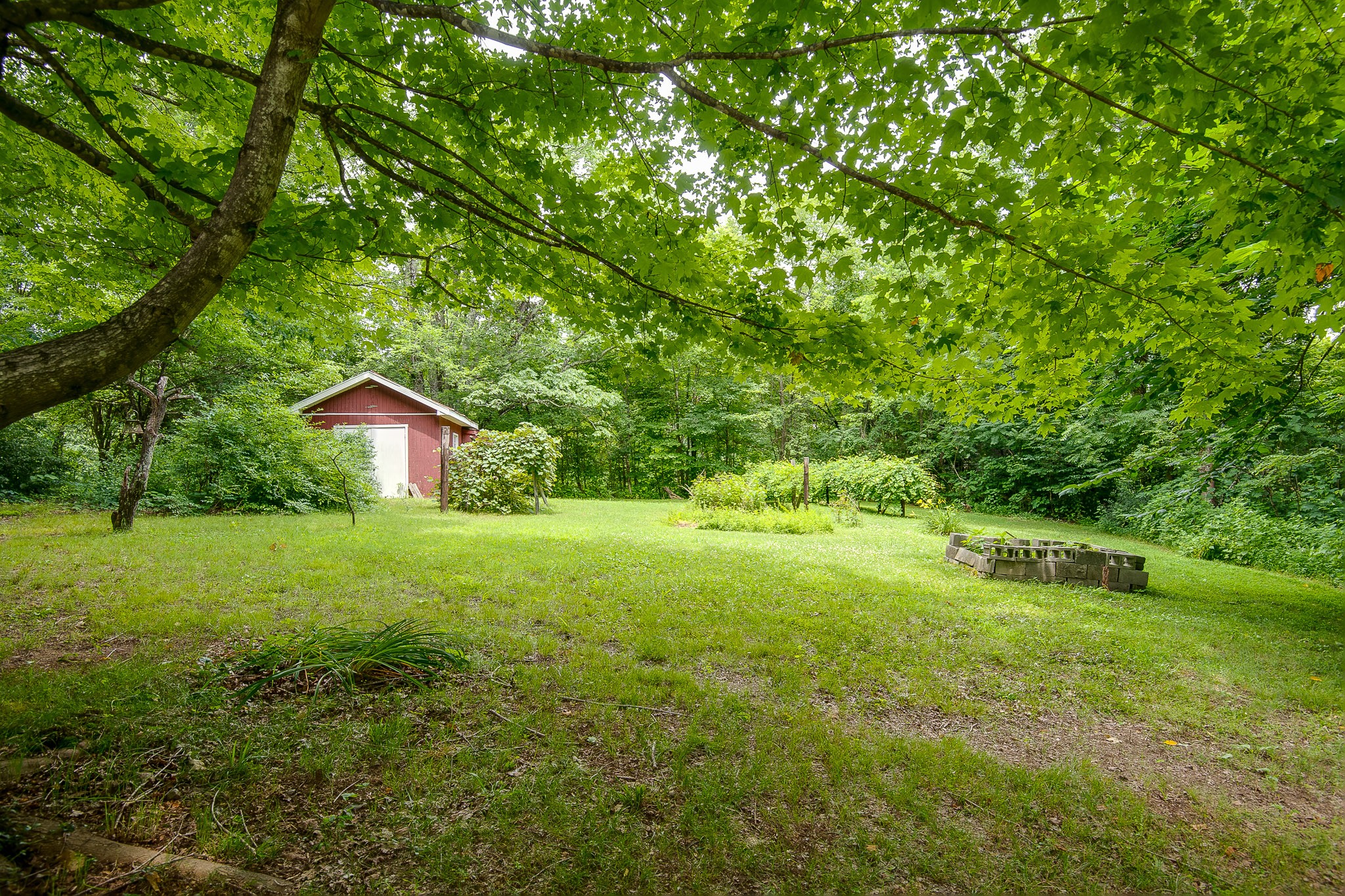 2645 Cole Ridge Road Beechgrove, TN 37018 - Photo 48 of 50 a backyard of a house with table and chairs