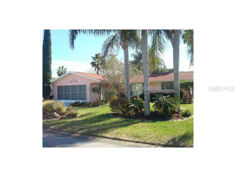 7140 Cherry Laurel Drive Port Richey, FL 34668 - Photo 1 of 1 a view of backyard with garden and entertaining space