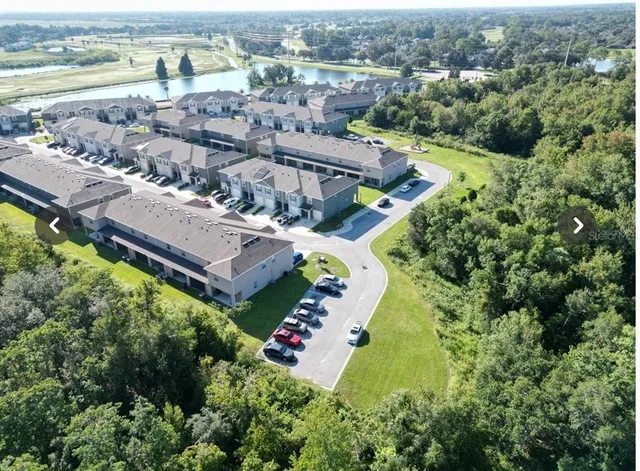 an aerial view of a house with a garden