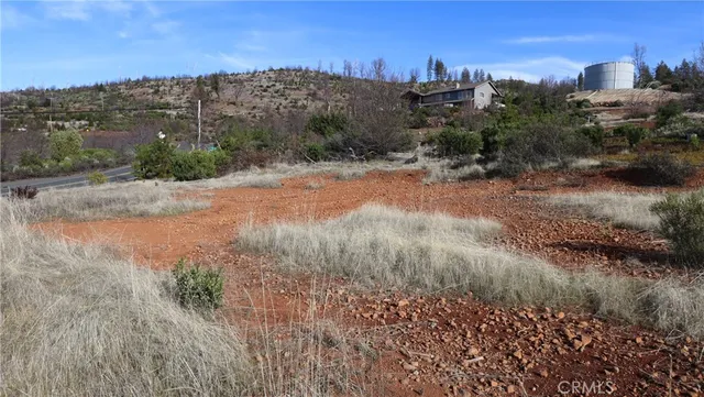 a view of a lake with mountains in the background