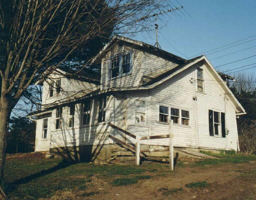 360 Kent Road South Cornwall, CT 06754 - Photo 1 of 1 a view of a white house with large windows