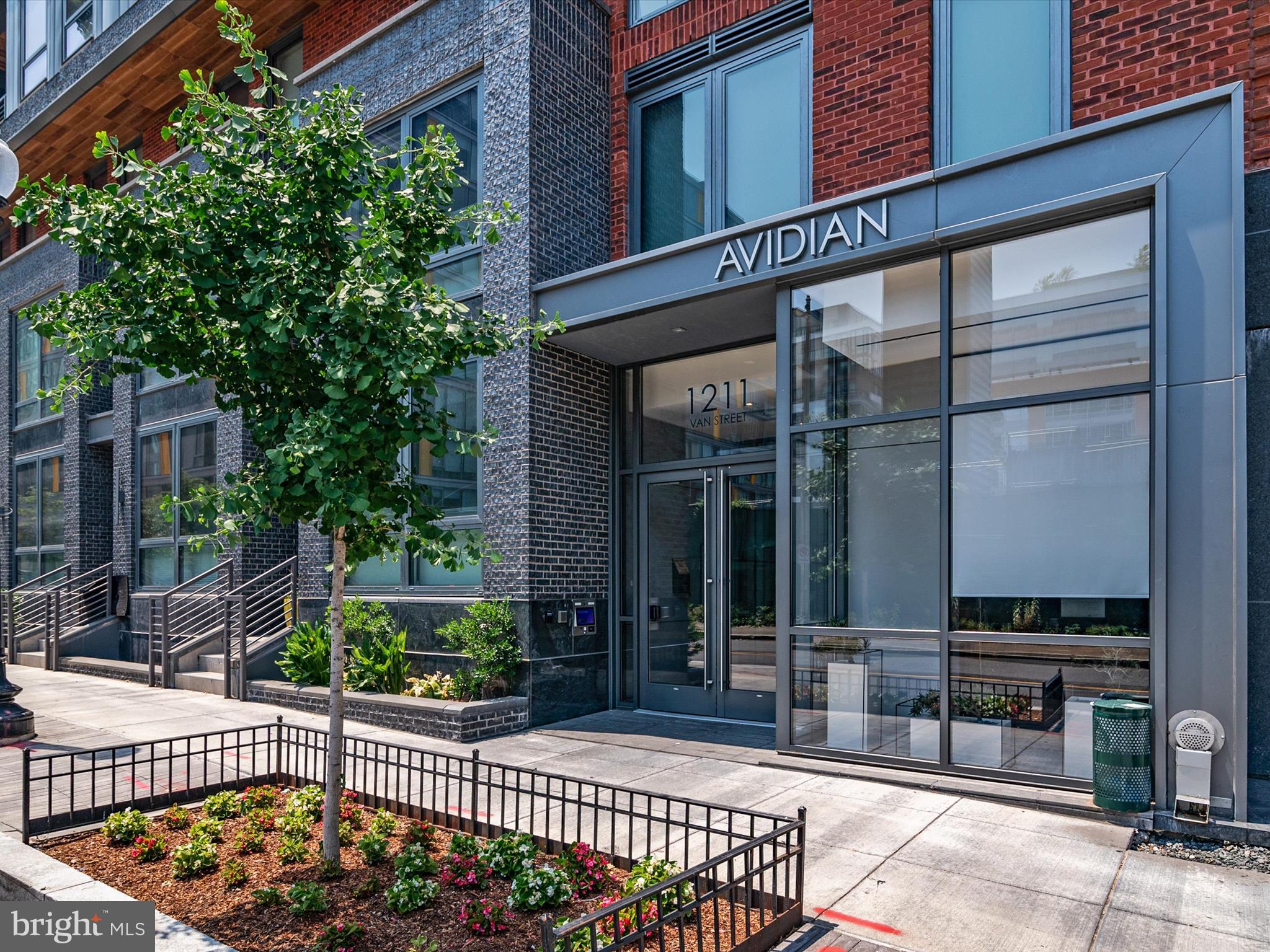 1211 Van Street Southeast, Unit 1110 Washington, DC 20003 - Photo 17 of 46 front view of a house with a balcony