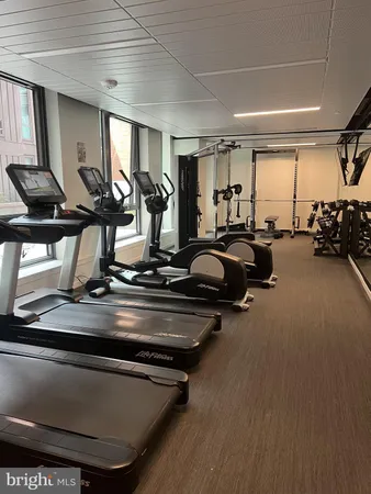 a view of a room with gym equipment