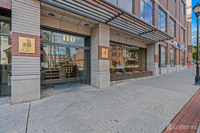 a view of a house with entrance gate