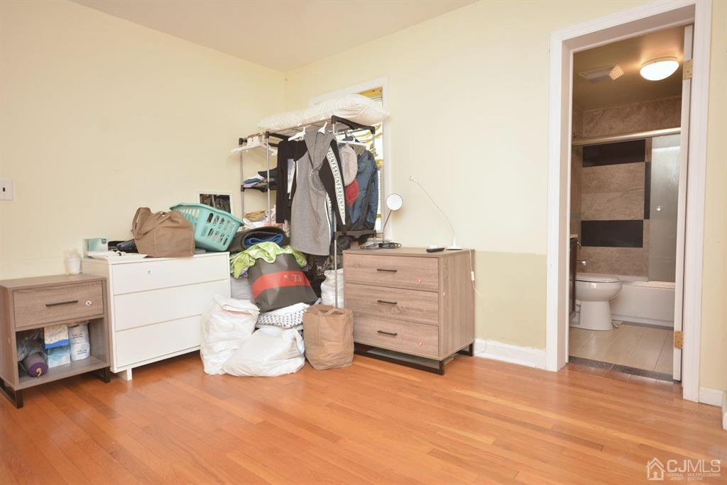 355 Metlars Lane Piscataway, NJ 08854 - Photo 19 of 29 a room with furniture and white walls
