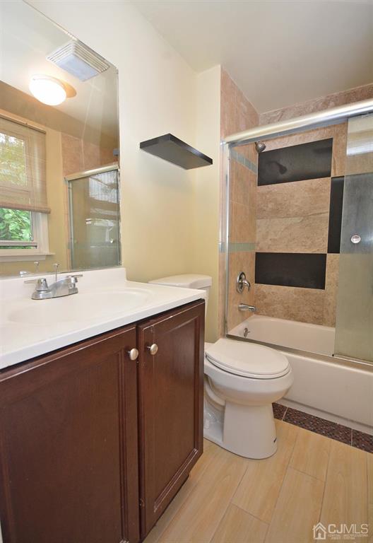 355 Metlars Lane Piscataway, NJ 08854 - Photo 21 of 29 a bathroom with a sink a toilet and shower