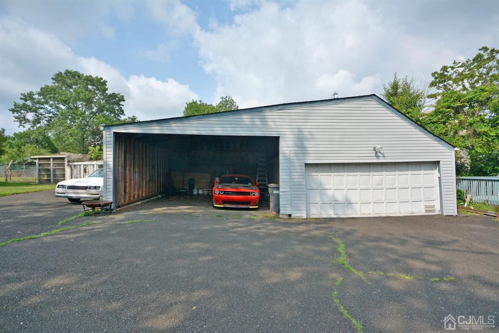 355 Metlars Lane Piscataway, NJ 08854 - Photo 3 of 29 a view of a car garage