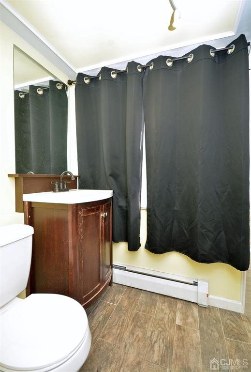 355 Metlars Lane Piscataway, NJ 08854 - Photo 10 of 29 a bathroom with a sink a toilet and shower