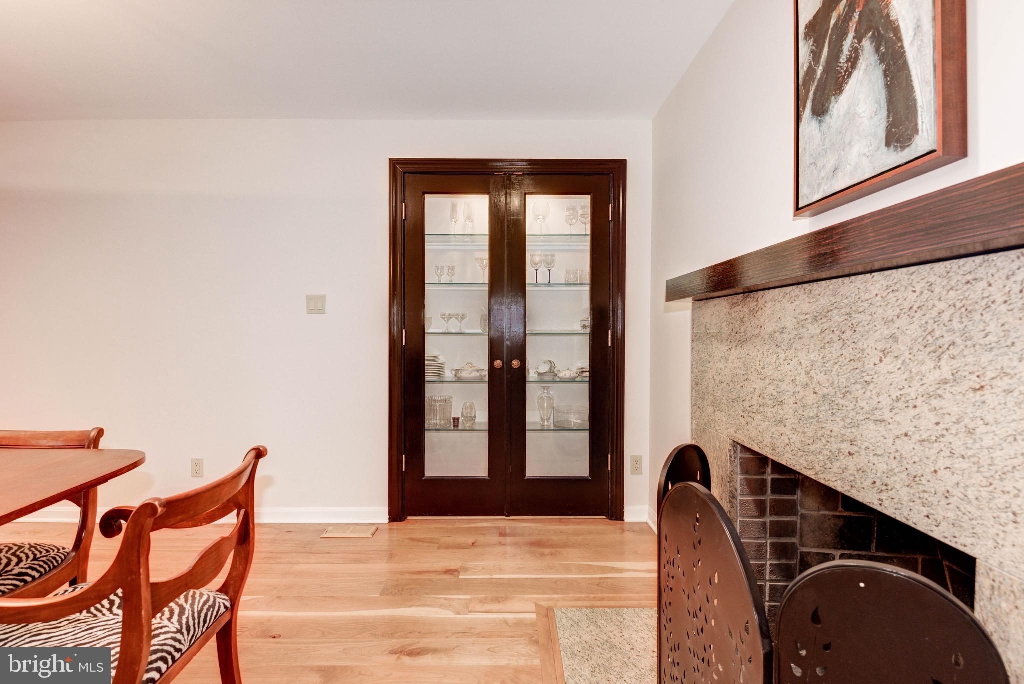 11719 Blue Smoke Trail Reston, VA 20191 - Photo 17 of 76 Dining room built in with lighting.