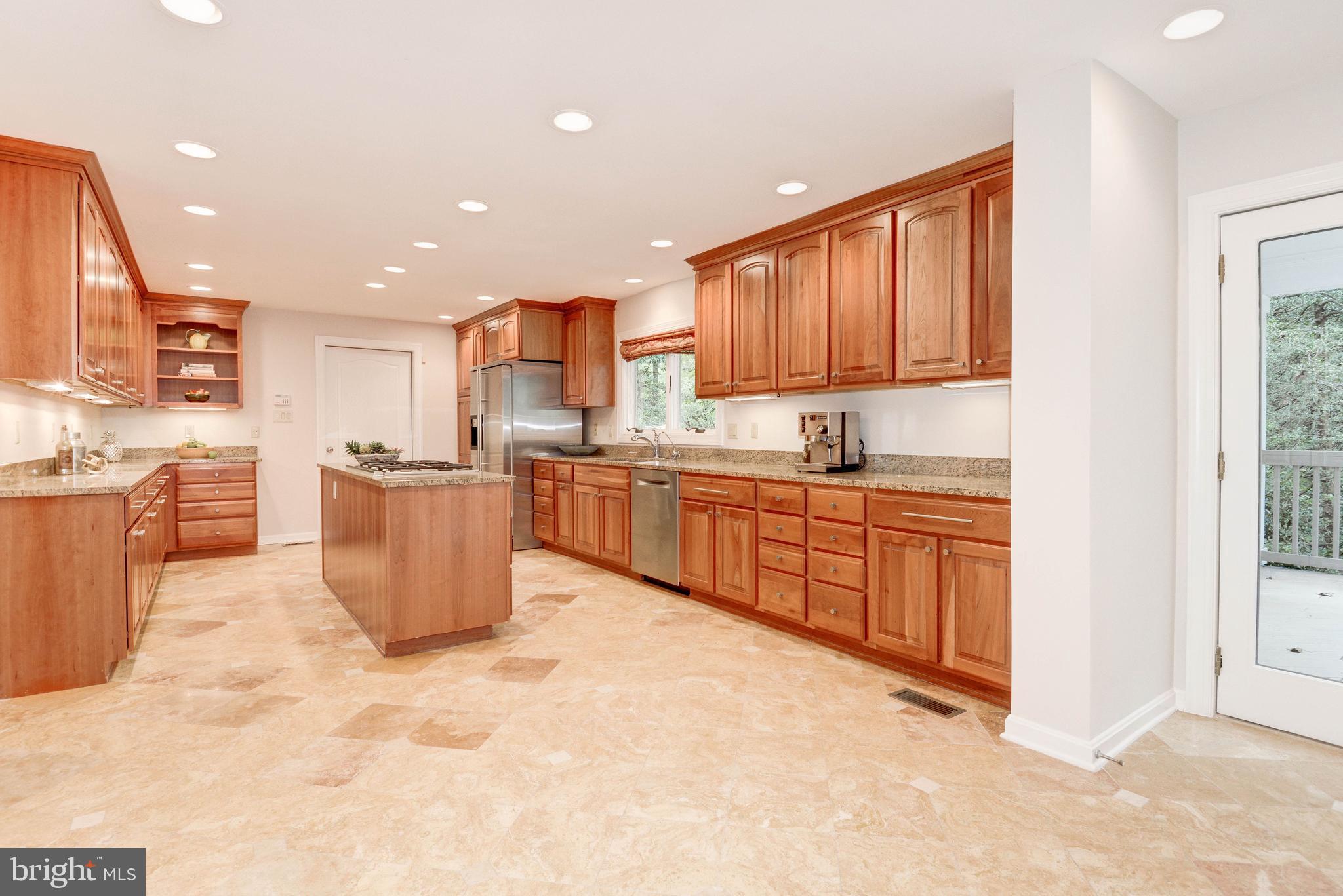 11719 Blue Smoke Trail Reston, VA 20191 - Photo 25 of 76 Travertine throughout the rear of main level.
