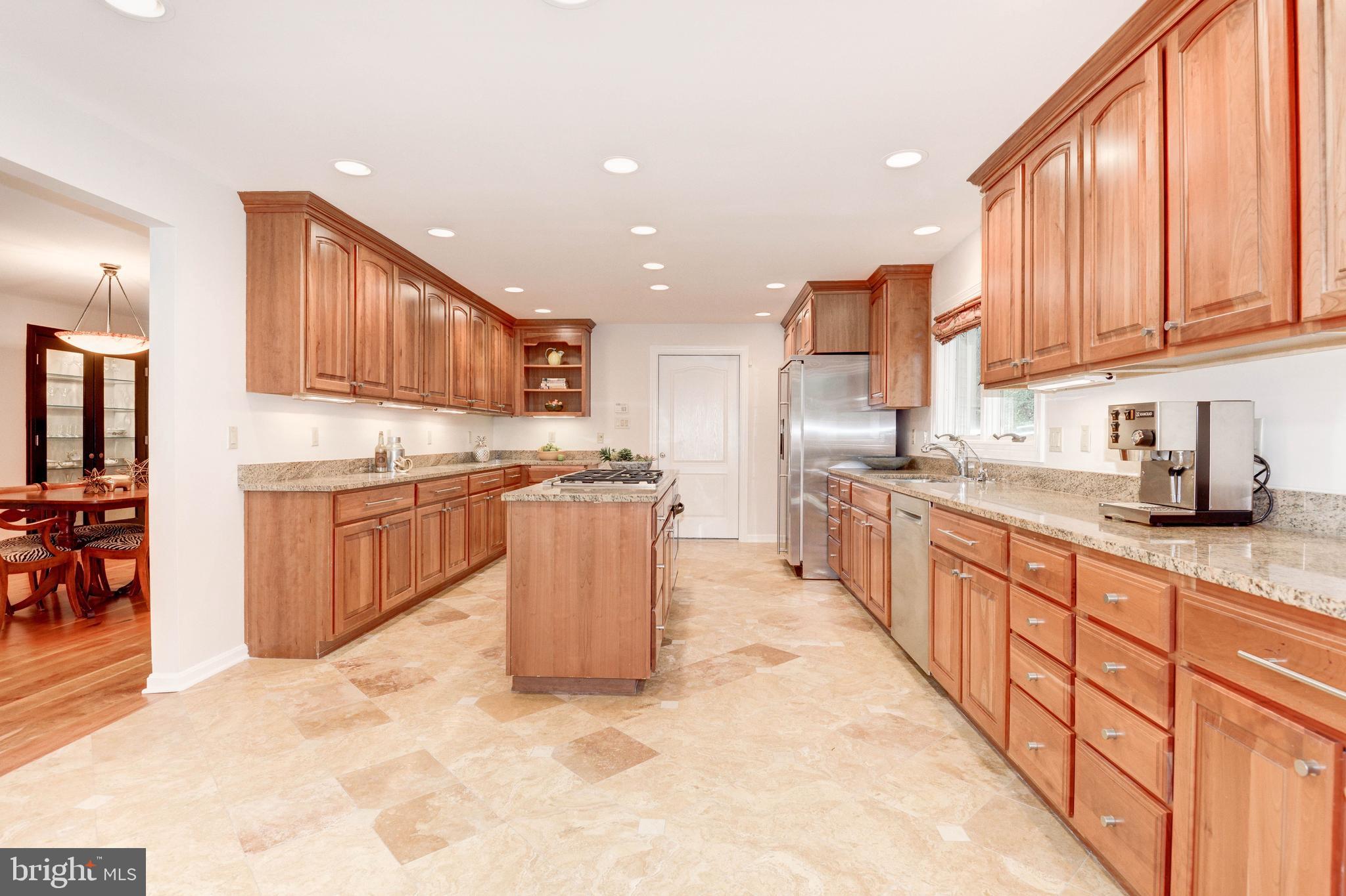 11719 Blue Smoke Trail Reston, VA 20191 - Photo 26 of 76 Spacious kitchen w/ island perfect for gatherings!