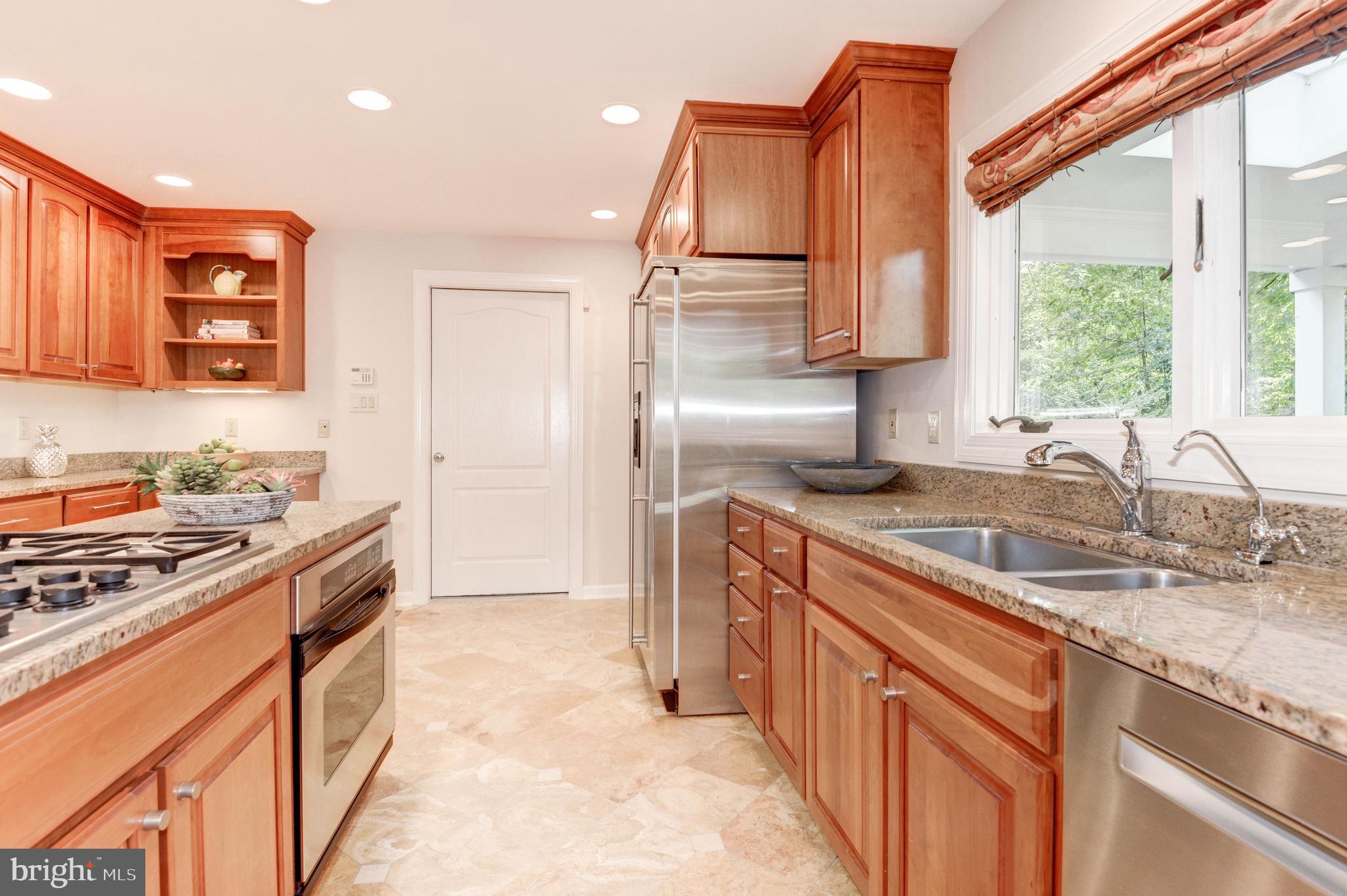 11719 Blue Smoke Trail Reston, VA 20191 - Photo 29 of 76 Gourmet kitchen with stainless and granite.