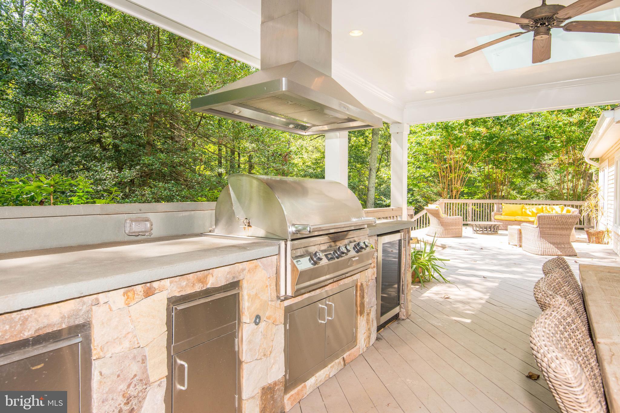 11719 Blue Smoke Trail Reston, VA 20191 - Photo 36 of 76 Beautiful stone outdoor cooking area.