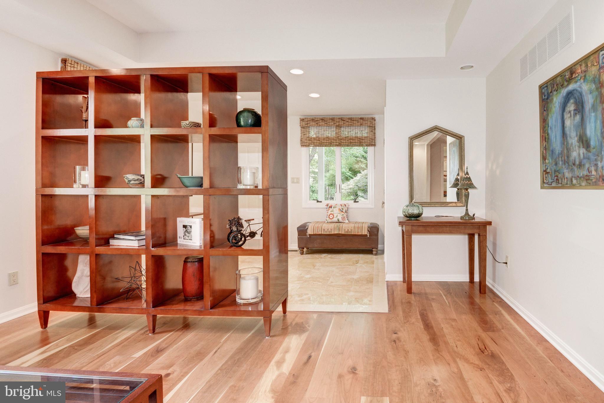 11719 Blue Smoke Trail Reston, VA 20191 - Photo 6 of 76 Living room to foyer view.