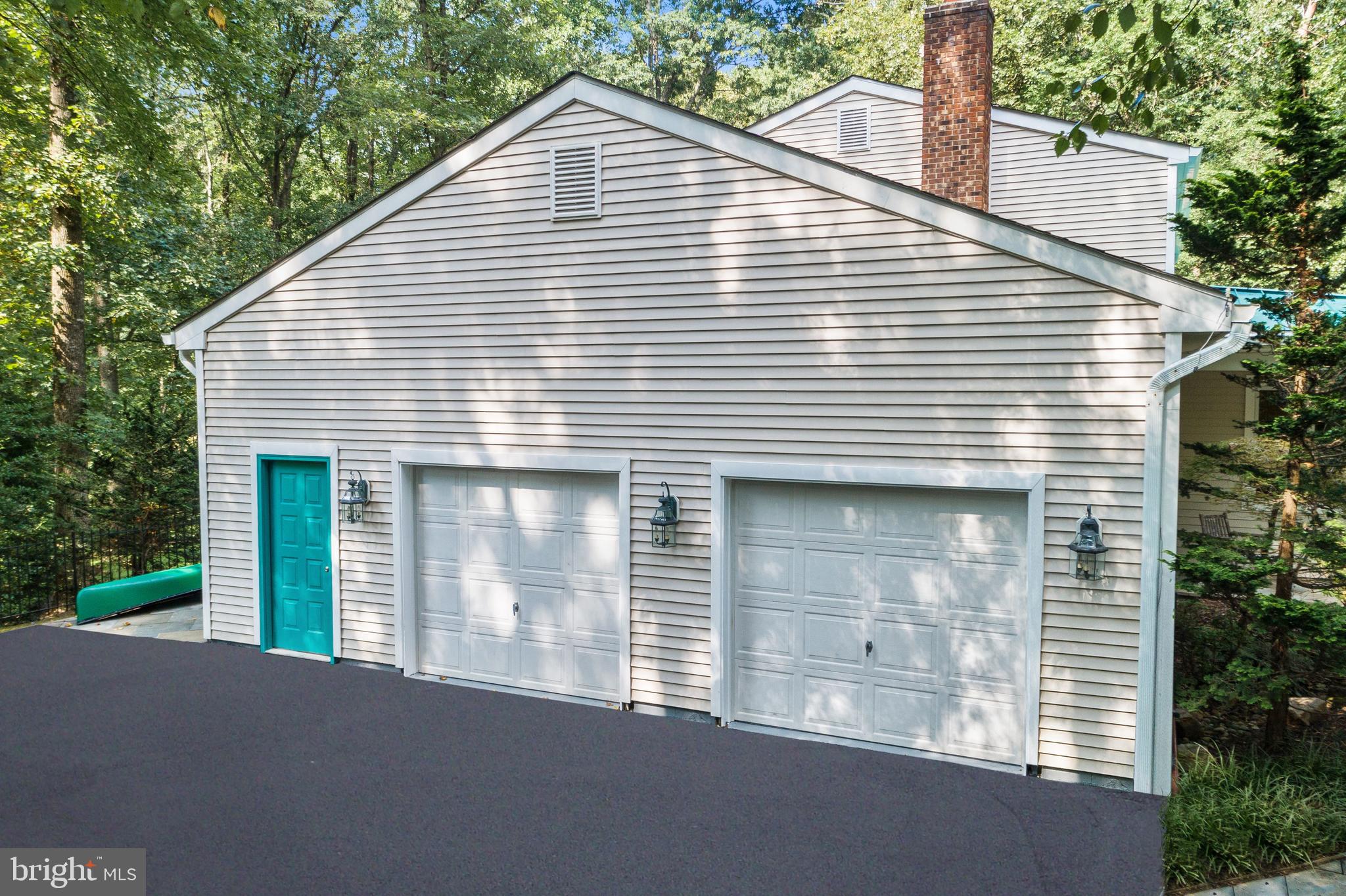 11719 Blue Smoke Trail Reston, VA 20191 - Photo 63 of 76 Huge 2 car garage freahly painted walls & floors.
